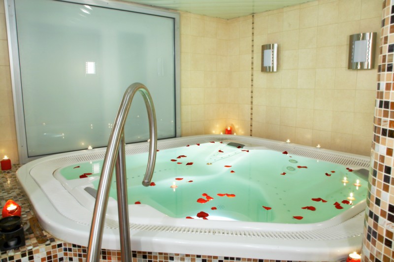 bathtub jacuzzi with petals