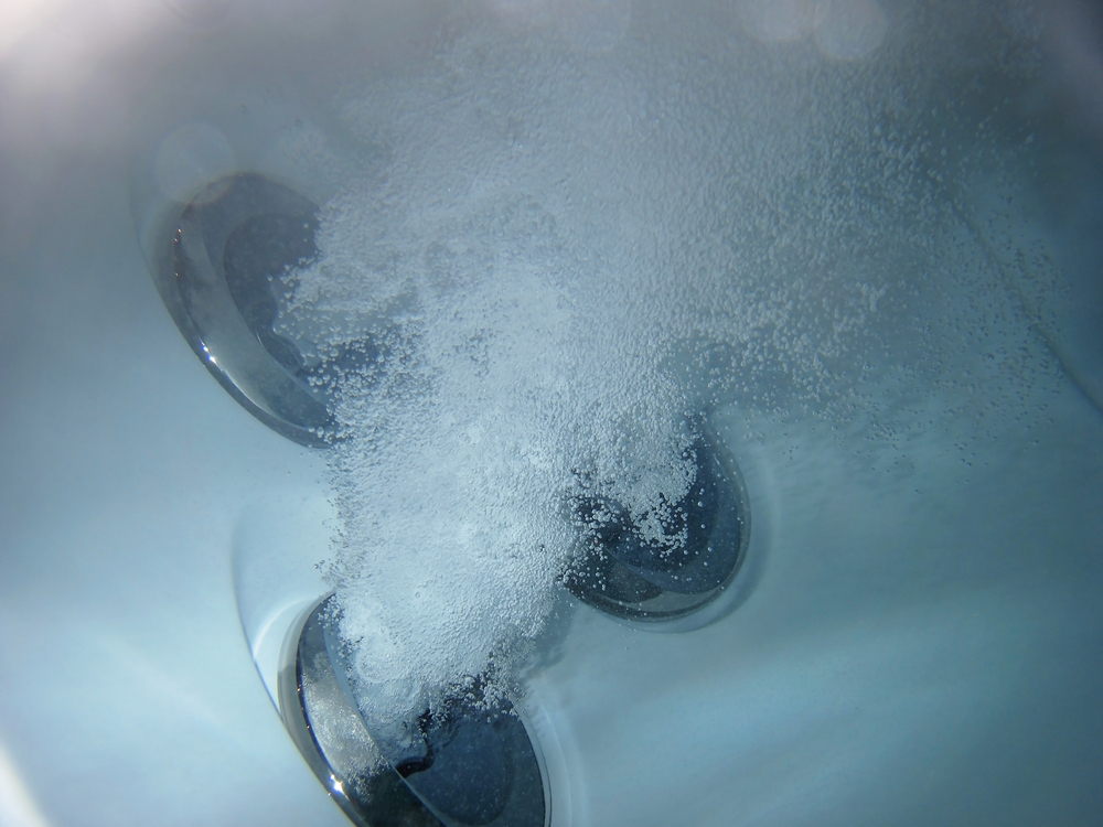 how to lower alkalinity in hot tub naturally