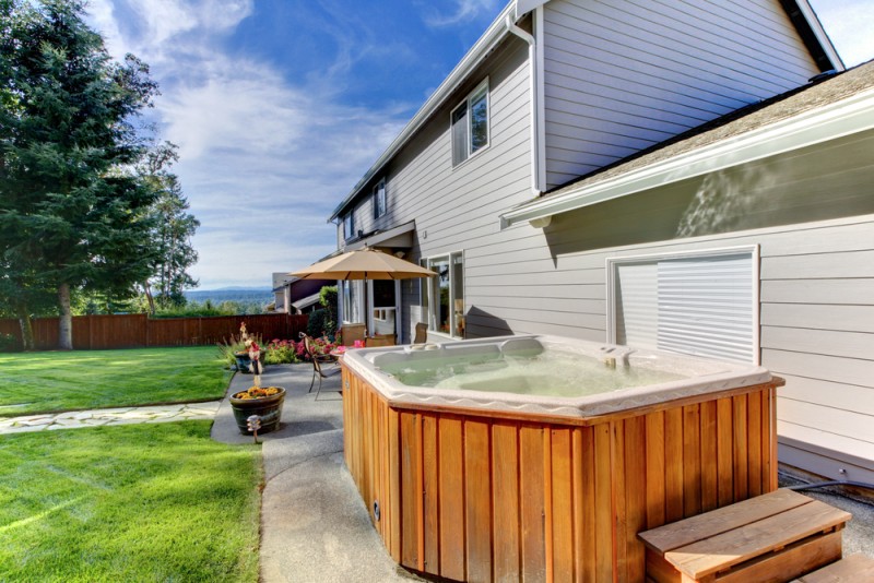 backyard with a huge hot tub